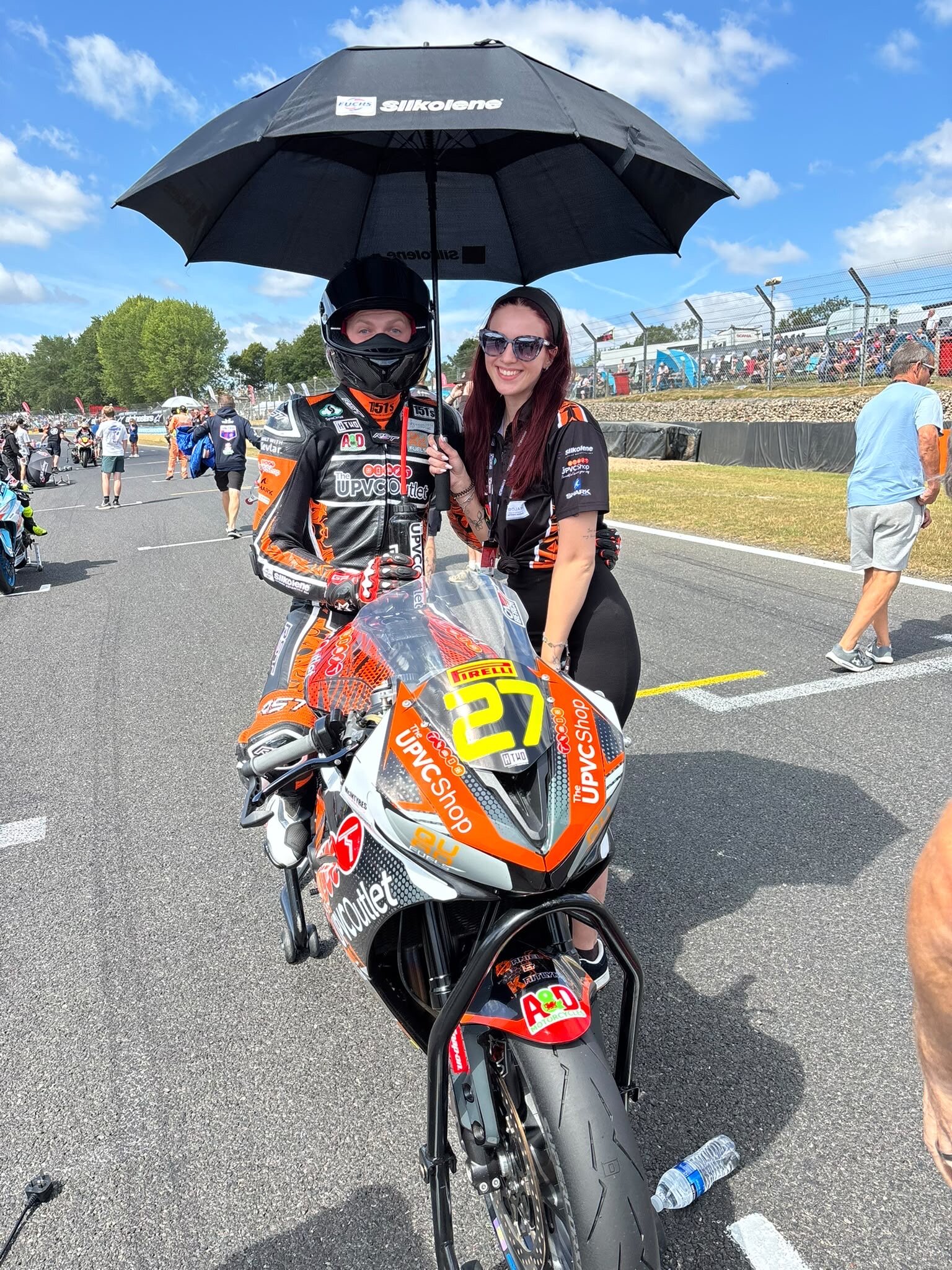 Paddock with fans and family