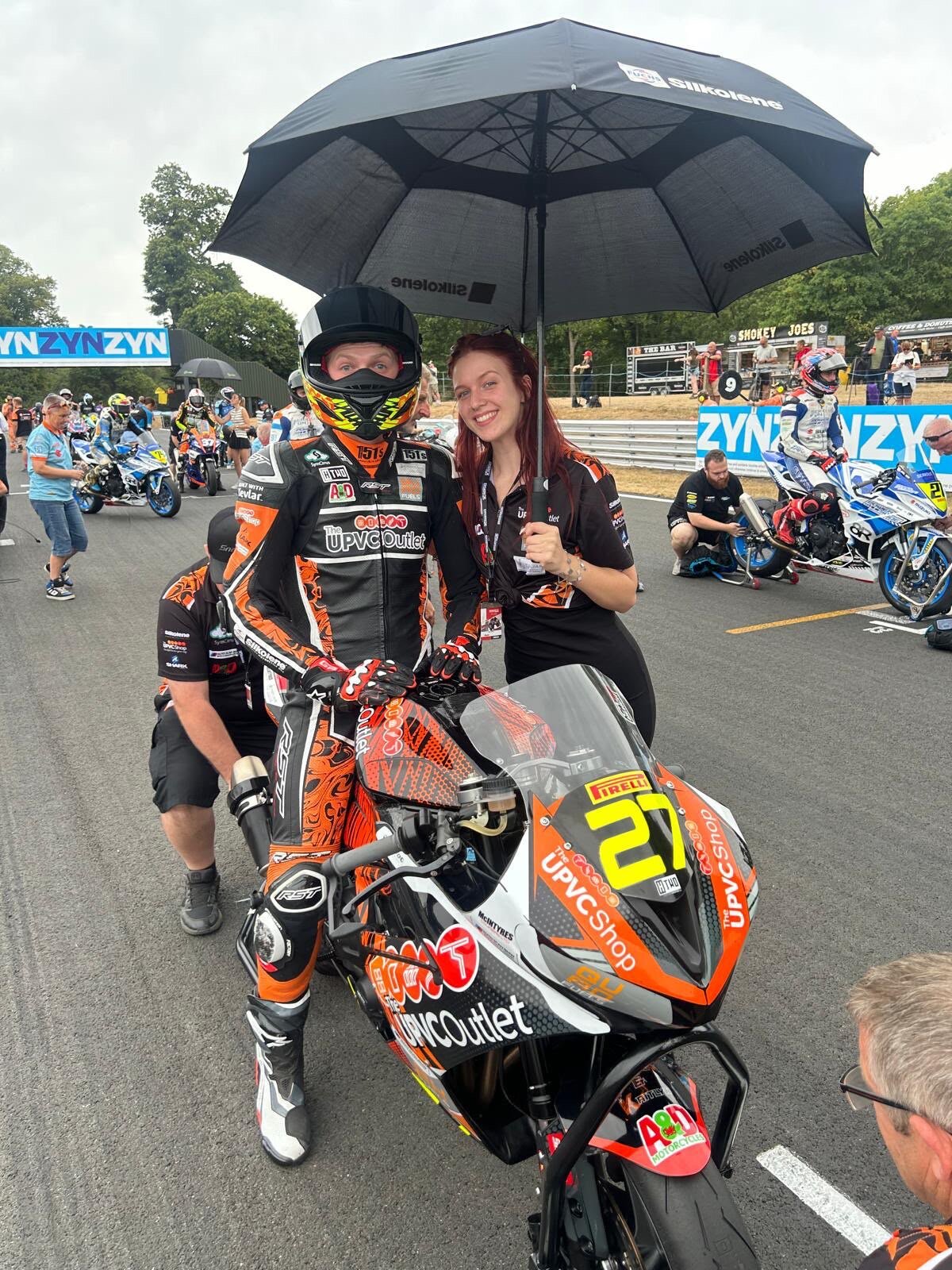 Paddock with fans and family