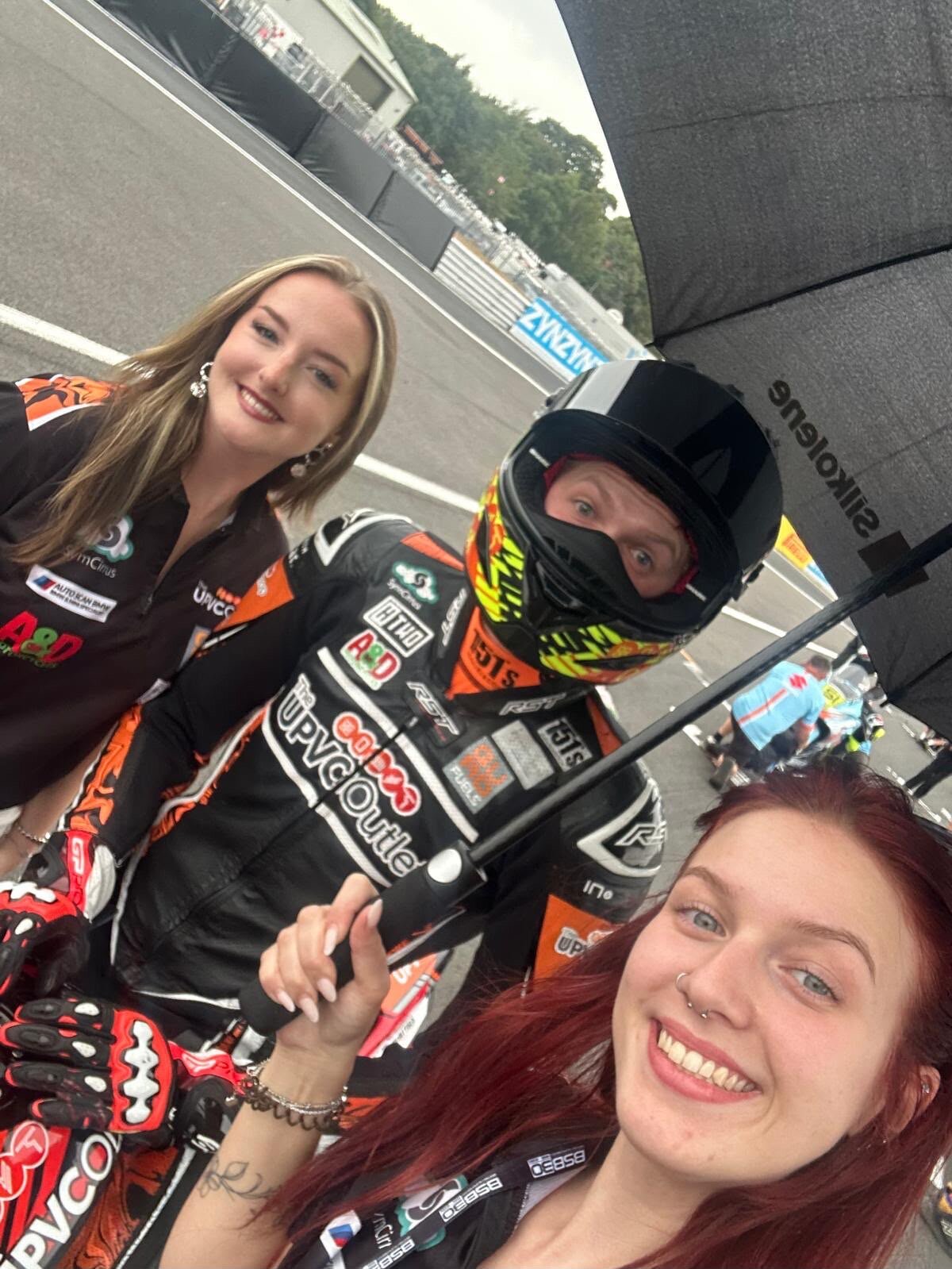 Paddock with fans and family