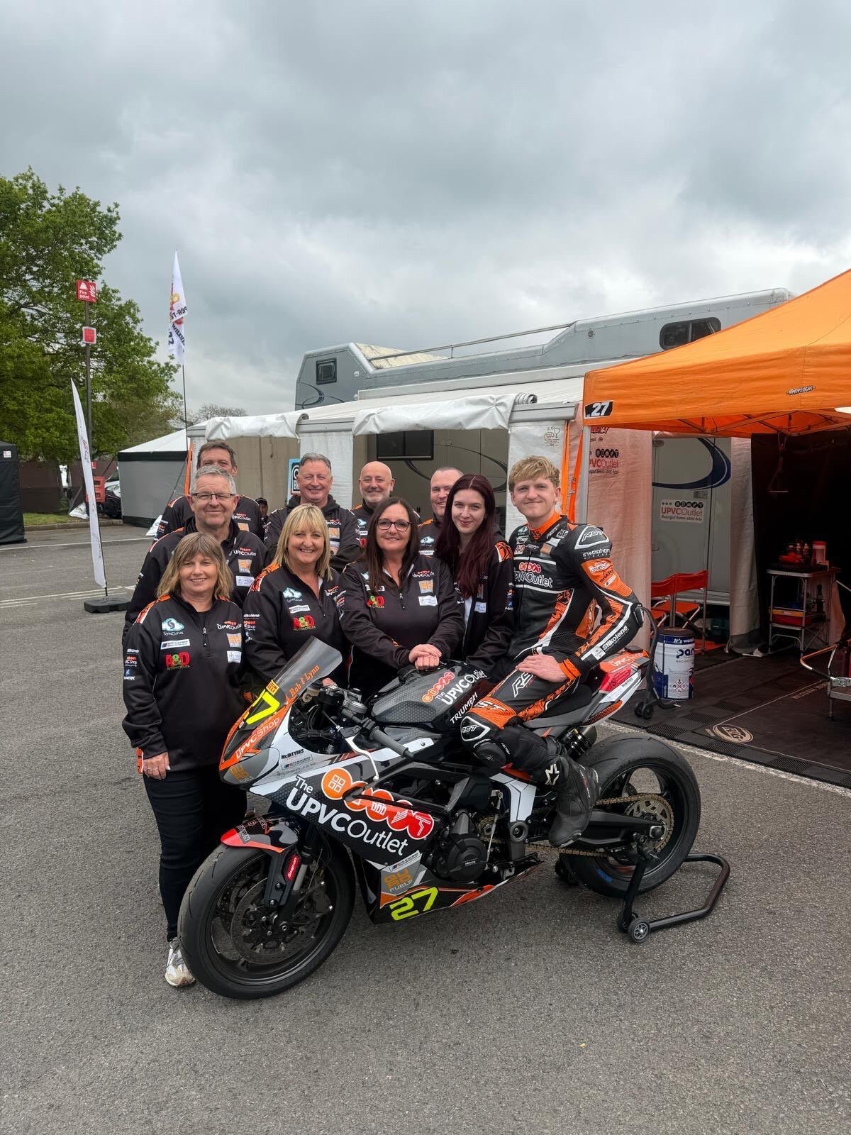 Paddock with fans and family