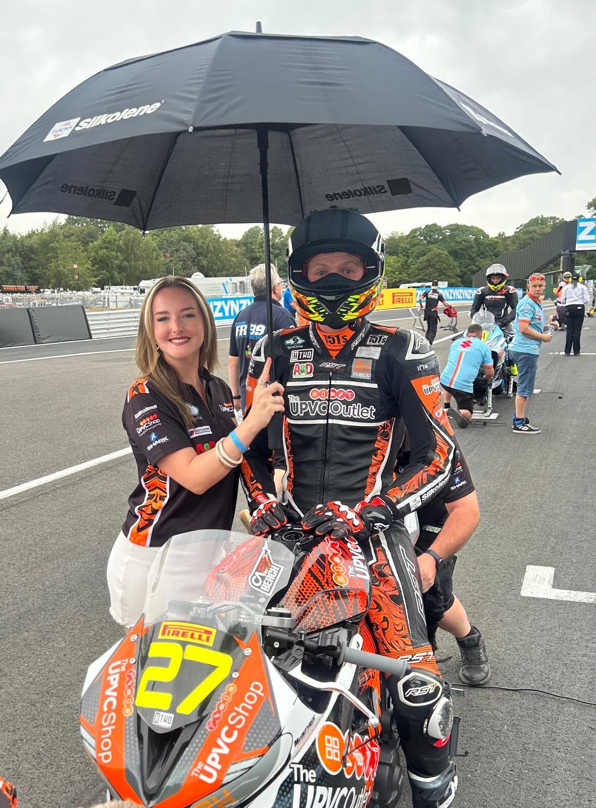 Paddock with fans and family