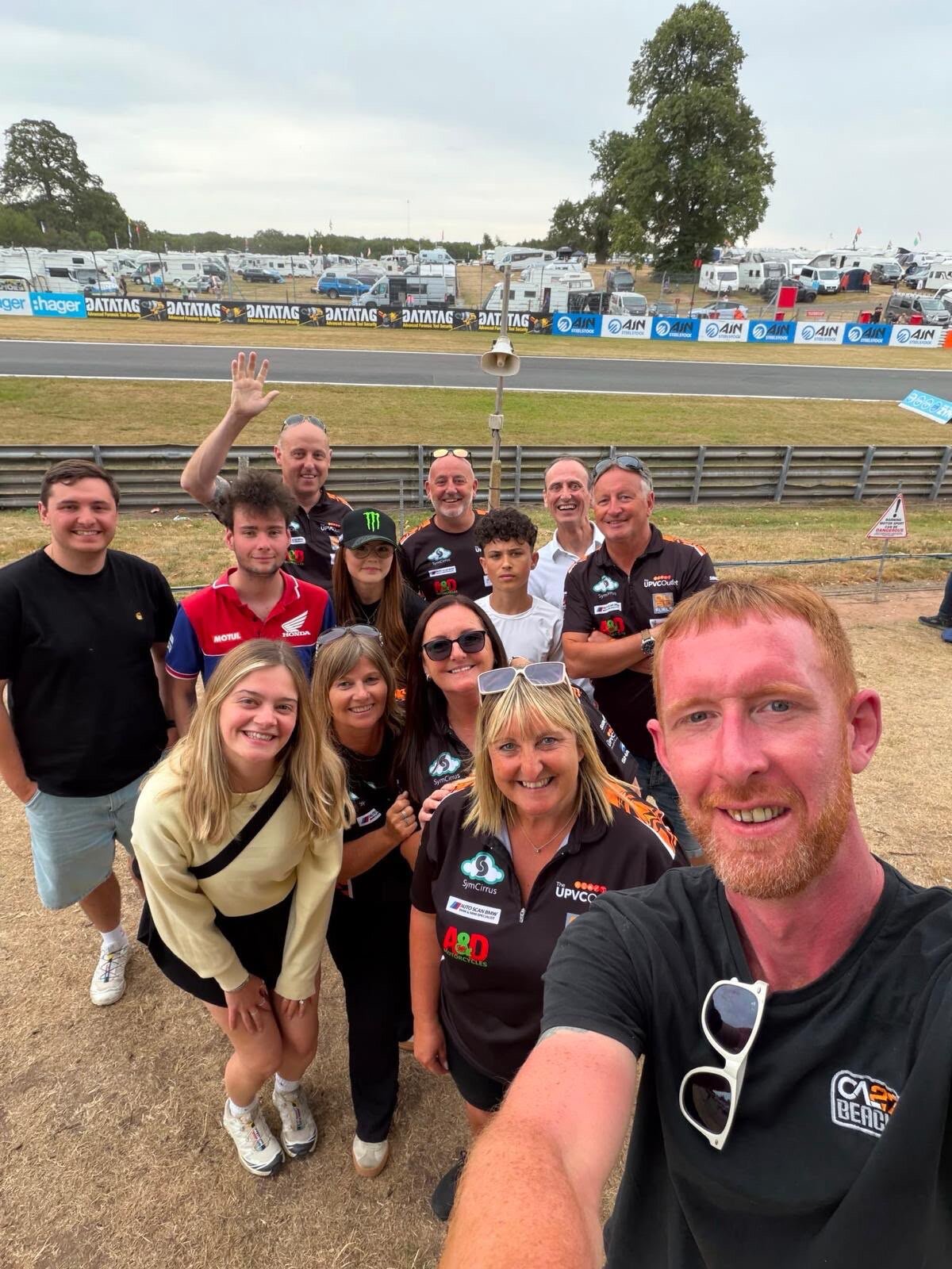 Paddock with fans and family