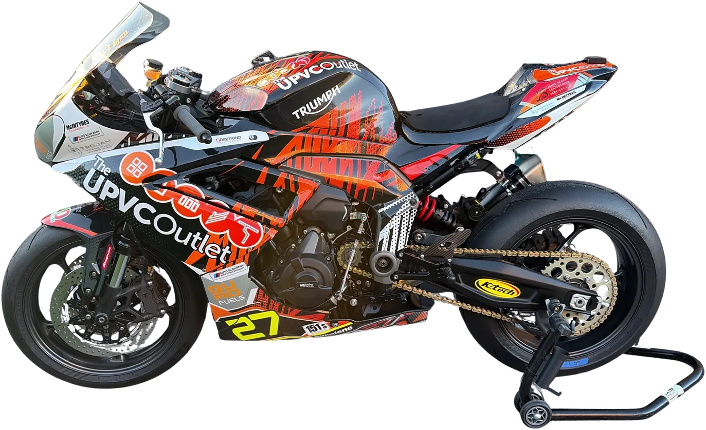 Calum's number 27 Triumph Daytona 660 side on, in UPVC Outlet orange and black livery